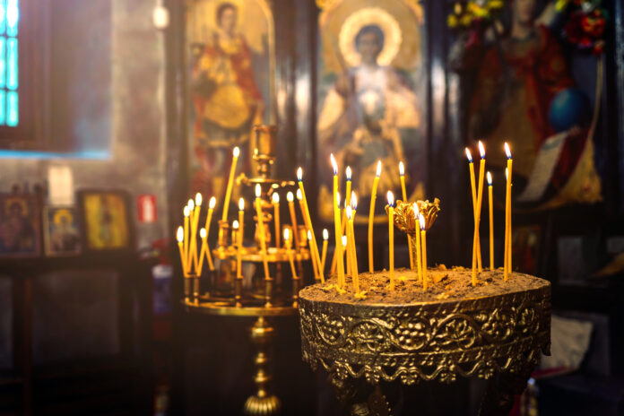A lot of candles in the orthodox church near the altar